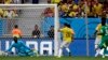 Colombia's Juan Quintero (20) scores his side's second goal during the Group C World Cup soccer match between Colombia and Ivory Coast at the Estadio Nacional in Brasilia, Brazil, June 19, 2014.