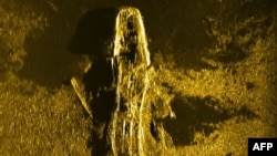 An undated handout sonar image released by Joint Agency Coordination Centre (JACC) on Jan. 13, 2016 shows an iron or steel-hulled shipwreck some 3,700 meters below the surface and believed to have gone down at the turn of the 19th century.