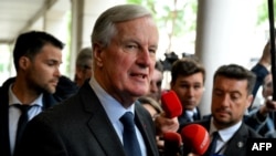 FILE - French Prime Minister Michel Barnier attends the French right-wing Horizons party conference for the new political year in Reims, eastern France, Sept. 11, 2024. 