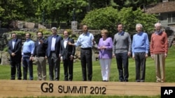 World leaders attend the family photo session during the G8 Summit at Camp David, Maryland, May 19, 2012.