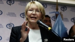 FILE - Venezuela's chief prosecutor Luisa Ortega Diaz talks to the media during a news conference in Caracas, Venezuela May 24, 2017. 