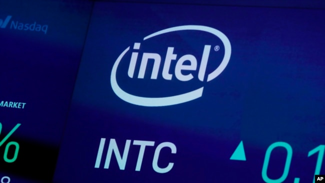 In this Oct. 1, 2019, file photo the symbol for Intel appears on a screen at the Nasdaq MarketSite, in New York. (AP Photo/Richard Drew, File)