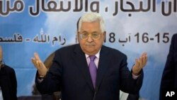 FILE - Palestinian President Mahmoud Abbas, centre, attends a meeting with top decision-making body the Palestinian Central Council, at his headquarters in the West Bank city of Ramallah.