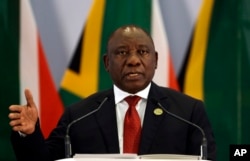 FILE - South African President Cyril Ramaphosa addresses a media conference at the end of the BRICS Summit in Johannesburg, South Africa, July 27, 2018.