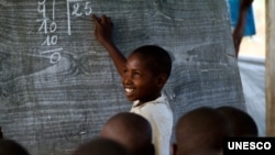 A young Congolese boy at the Mugosi Primary School which mainly serves children of the Kahe refugee camp in northeastern Democratic Republic of the Congo