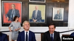 Dutch PM Mark Rutte w/ Geert Wilders