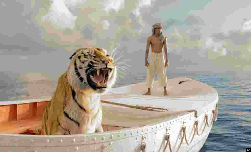 This film image released by 20th Century Fox shows Suraj Sharma as Pi Patel in a scene from "Life of Pi." (20th Century Fox)