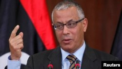 Libya's Prime Minister Ali Zeidan speaks during a news conference at the headquarters of the Prime Minister's Office in Tripoli, Jan. 3, 2013.