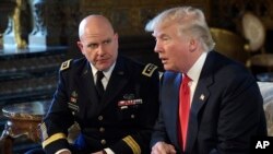 President Donald Trump, right, speaks as Army Lt. Gen. H.R. McMaster, left, listens at Trump's Mar-a-Lago estate in Palm Beach, Fla., Feb. 20, 2017, where Trump announced that McMaster will be the new national security adviser.