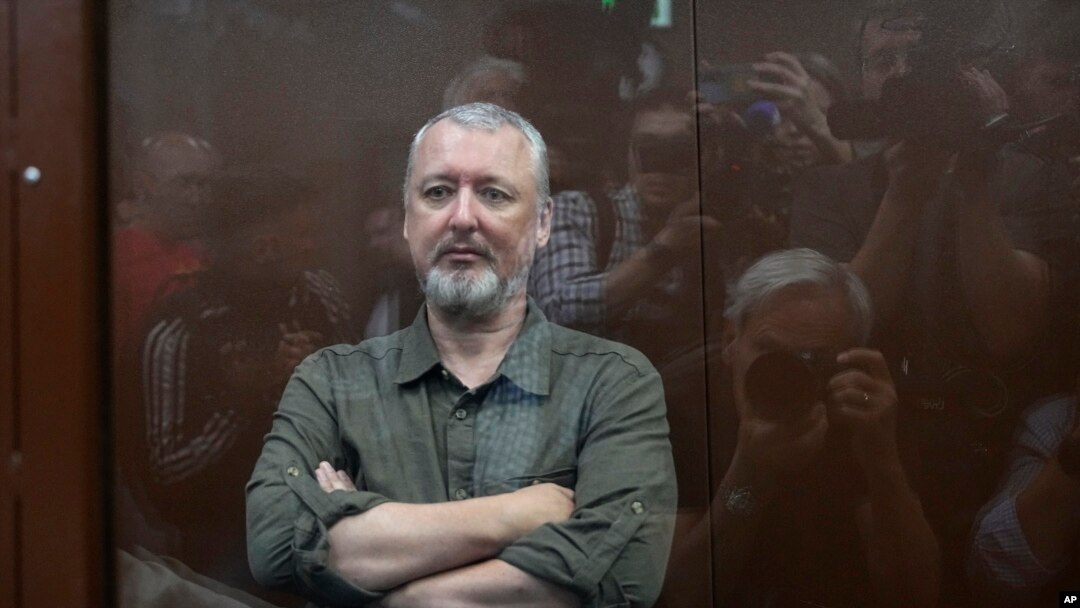 Igor Girkin sits in a glass cage in a courtroom at the Meshchansky District Court in Moscow, July 21, 2023.