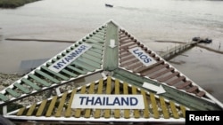 Border sign on Mekong River