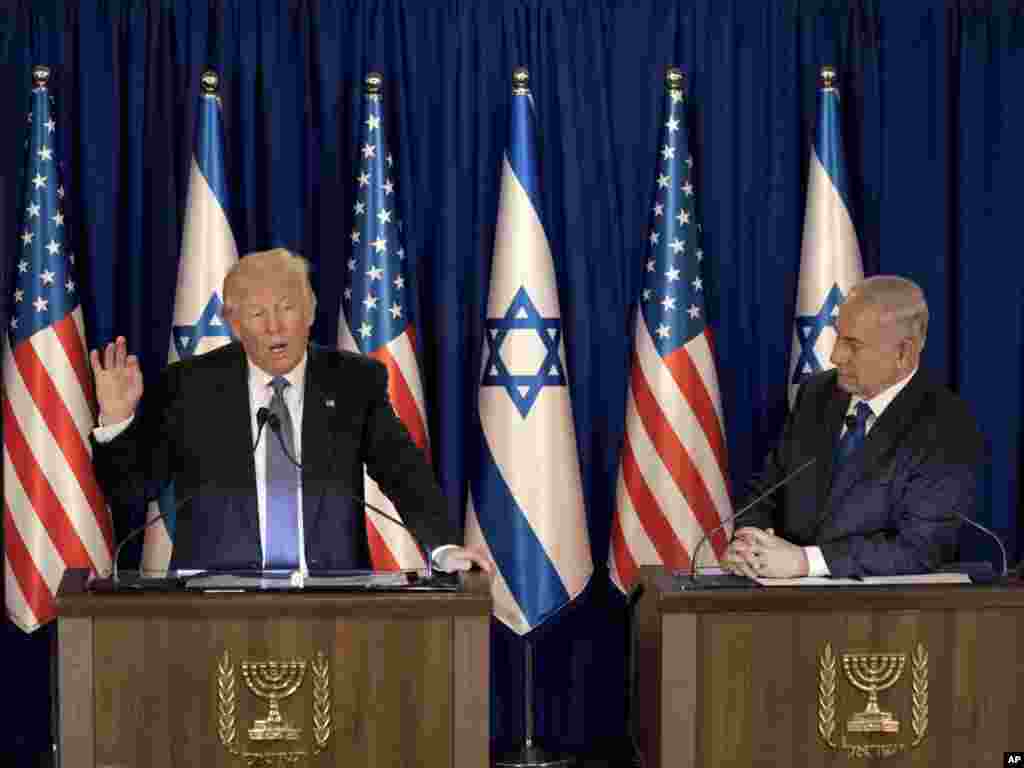 U.S. President Donald Trump talks during a briefing after his meeting with Israeli Prime Minister Benjamin Netanyahu, right, in Jerusalem, May 22, 2017.