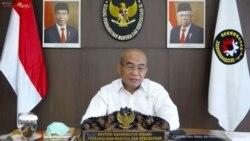 Menko PMK Muhadjir Effendy mengungkapkan setidaknya 130 kab/kota mengalami tren kenaikan kasus Corona. (VOA)