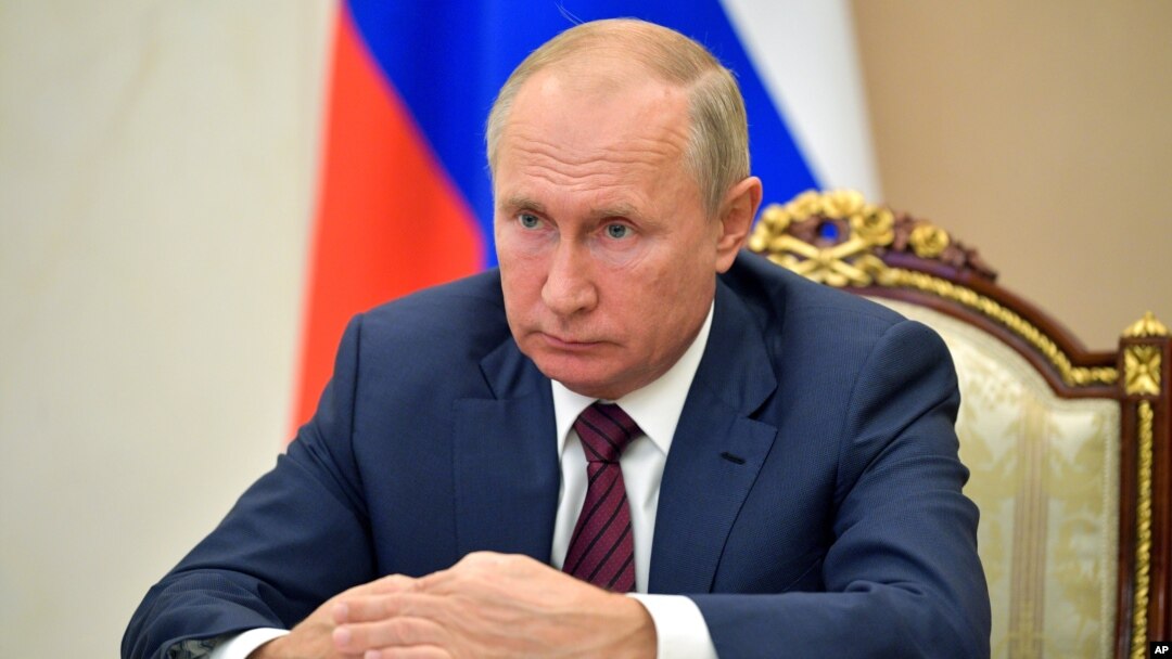 Russian President Vladimir Putin attends a meeting via video conference in Moscow, Russia, Thursday, Nov. 5, 2020. (Alexei Druzhinin, Sputnik, Kremlin Pool Photo via AP)