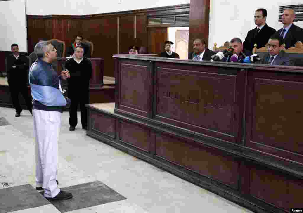 Al Jazeera journalist Mohamed Fahmy speaks before the judge during his retrial at a court in Cairo, Feb. 12, 2015.