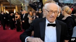 FILE - Eli Wallach arrives before the 83rd Academy Awards.