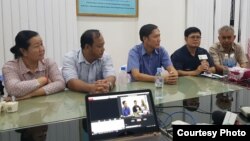 FILE: Ms. Lim Mony (left), Nai Vongda, Ny Sokha, and Yi Sokhan, four Adhoc rights defenders, talked to media after they were released from prison on bail, on June 29, 2017. (Courtesy photo of Licahdo)