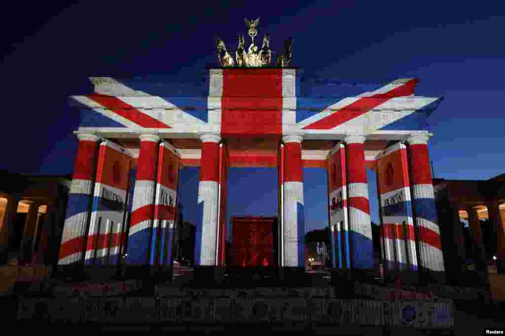 The Brandenburg Gate is illuminated with the colors of the British flag to show solidarity with the victims of the recent attack in London, in Berlin, Germany, June 4, 2017.