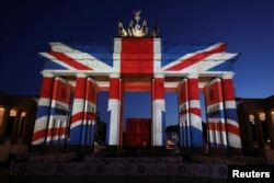 The Brandenburg Gate is illuminated with the colours of the British flag to show solidarity with the victims of the recent attack in London, in Berlin, Germany June 4, 2017.