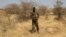 FILE - A Nigerien soldier takes a position during Flintlock 2014, a U.S.-led international training mission for African militaries, in Diffa, March 6, 2014.