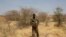 FILE - A Nigerien soldier takes a position during Flintlock 2014, a U.S.-led international training mission for African militaries, in Diffa, March 6, 2014.