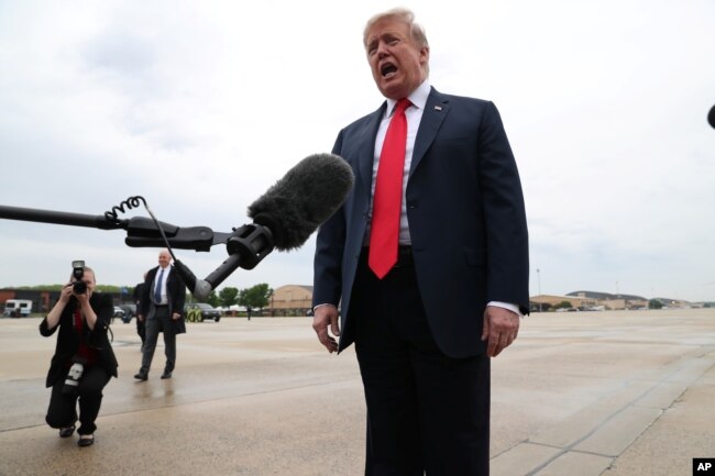 U.S. President Donald Trump speaks to reporters before boarding Air Force One for travel to Indianapolis, Indiana, at Joint Base Andrews, Maryland, outside Washington, D.C, April 26, 2019.