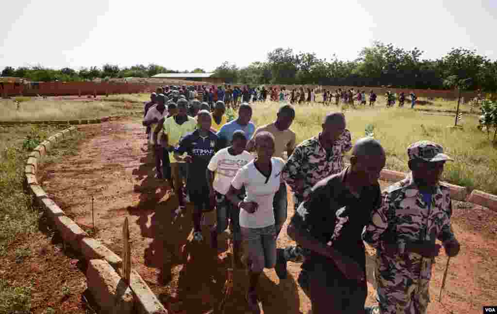 Young people run during a training session at the North Liberation Forces camp in Sevare, Mali on September 24, 2012. 