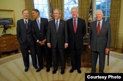 Then President George W. Bush (center) with (from left to right) former President George H.W. Bush, President-elect Barack Obama, former President William J. Clinton and former President Jimmy Carter in the Oval Office at the White House, Jan. 7, 2009. (Photo by Mary F. Calvert/The Washington Times)