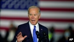 President Joe Biden speaks at an event at the Kansas City Area Transit Authority, in Kansas City, Missouri, Dec. 8, 2021.