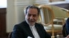 FILE - Iranian Foreign Minister Abbas Araghchi attends a meeting with Qatari Prime Minister and Foreign Minister Sheikh Mohammed bin Abdulrahman Al Thani, in Tehran, Iran, Aug. 26, 2024.