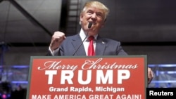 FILE - U.S. Republican presidential candidate Donald Trump addresses the crowd during a campaign rally in Grand Rapids, Michigan, Dec. 21, 2015.