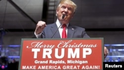 FILE - U.S. Republican presidential candidate Donald Trump addresses the crowd during a campaign rally in Grand Rapids, Michigan, Dec. 21, 2015.