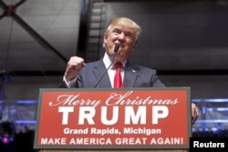 U.S. Republican presidential candidate Donald Trump addresses the crowd during a campaign rally in Grand Rapids, Michigan, Dec. 21, 2015.