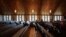 Roughly a dozen people attend pastor Ryan Burge's Sunday service at First Baptist Church in Mt. Vernon, Ill., Sept. 10, 2023. Burge is the author of "The Nones," a book on the growing number of religiously unaffiliated Americans. 