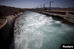 FILE - The Colorado River Aqueduct is seen in Hayfield Lake, California, May 18, 2015.