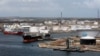 ARCHIVO - Petroleros atracados en la terminal de PDVSA de la Refinería de Petróleo Isla en Willemstad, en la isla de Curazao, en febrero de 2019.
