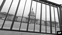 The Capitol plaza is seen as automatic spending cuts are set to take effect on March 1, in Washington, February 26, 2013.