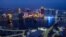 (FILES) This file photo taken on January 30, 2020 shows a general view of Macau city from the observation deck of Macau Tower. - Macau's gaming revenue was virtually wiped out in April 2020 as casinos suffered their worst month on record owing to…