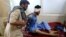 An injured man receives a treatment at the hospital, after a suicide attack in Jalalabad, Afghanistan, June 13, 2019.