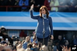 Argentina's former President Cristina Fernandez waves during a rally on the outskirts of Buenos Aires, June 20, 2017. Fernandez appeared before thousands of followers to launch the new political front Unidad Ciudadana or Citizens Unity Party.
