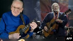 Clockwise from top left, Les Paul, Willie Nelson, B.B. King and Chuck Berry are all considered masters of the guitar in their own way.