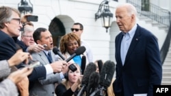 US President Joe Biden speaks to the media prior to departing on Marine One from the South Lawn of the White House in Washington, DC, on October 3, 2024, as he travels to Florida and Georgia to view damage from Hurricane Helene.