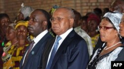 DRC opposition political leader Etienne Tshisekedi (Center R) and opposition leader Diomi Ndongala (Center L) are seen at a mass for peace at the Notre Dame church if Kinshasa in this June 22, 2012, file photo.