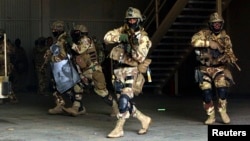 FILE - Members of Iraqi special operations forces are seen in Baghdad, Iraq.