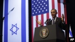 President Barack Obama gestures during his speech at the Jerusalem Convention Center, March 21, 2013.