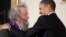 FILE - President Barack Obama presents a 2010 National Medal of Arts to poet Donald Hall, during in a ceremony in the East Room of the White House in Washington, March 2, 2011. 