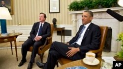 Presiden Barack Obama menjamu PM Inggris David Cameron di Kantor Oval, Gedung Putih di Washington (13/5).