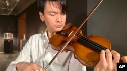 Violinist Stefan Jackiw plays the 1714 Joachim-Ma Stradivarius at Sotheby's auction house in New York on Feb. 3, 2025, where it is expected to sell for $12 million to $18 million this week. 