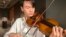 Violinist Stefan Jackiw plays the 1714 Joachim-Ma Stradivarius at Sotheby's auction house in New York on Feb. 3, 2025, where it is expected to sell for $12 million to $18 million this week. 