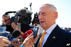 FILE - Secretary of Defense Jim Mattis speaks to reporters about North Korea at the Pentagon, May 25, 2018.